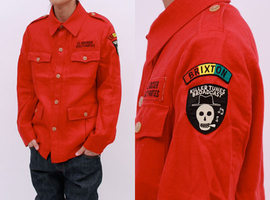 The iconic red coat from Japanese streetware label Wacko Maria's S/S 2009 collection, which drew inspiration from the post-war Jamaican heritage of Brixton. Particularly at stake were the conflicts among the Jamaican immigrants and British police force in the 70s and 80s and the history of drugs, gambling, and violence that once consumed SE London.