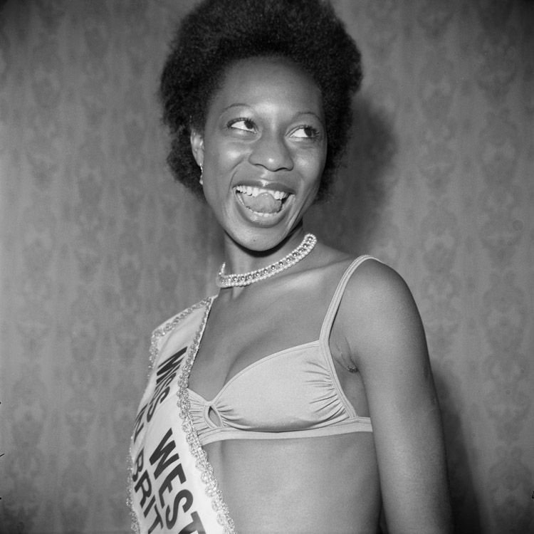 Miss West Indies in Great Britain contestant posing at Blythe Road, Hammersmith, London, 1970s